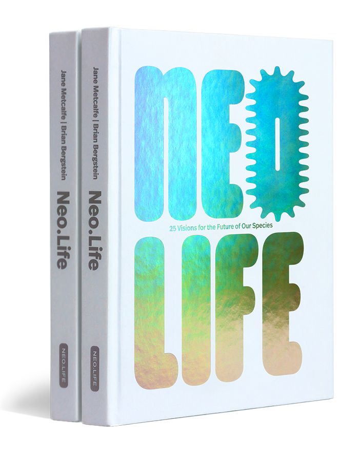 2 white books with metallic letters that say NeoLife 25 Visions for the Future of Our Species Jane Metcalfe Brian Bergstein